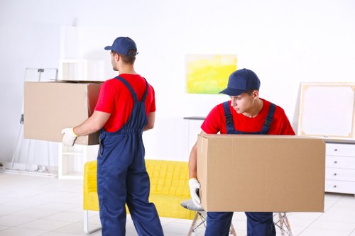 Removal team planning a house move in a Shoreditch street