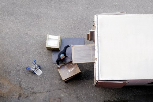 Driver and helper moving boxes for a Shoreditch office delivery